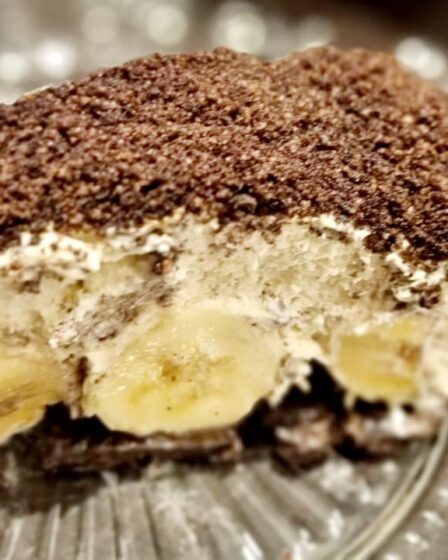 a piece of cake with bananas on top